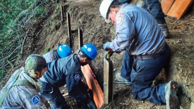 Youth Workforce Development participants working on trail maintenance 