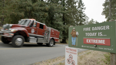 Fire truck and fire danger sign