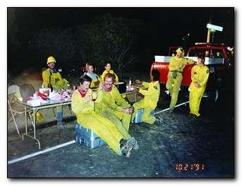 Group of people wearing all yellow relaxing in the evening
