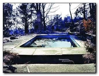 Swimming pool in the aftermath of a fire